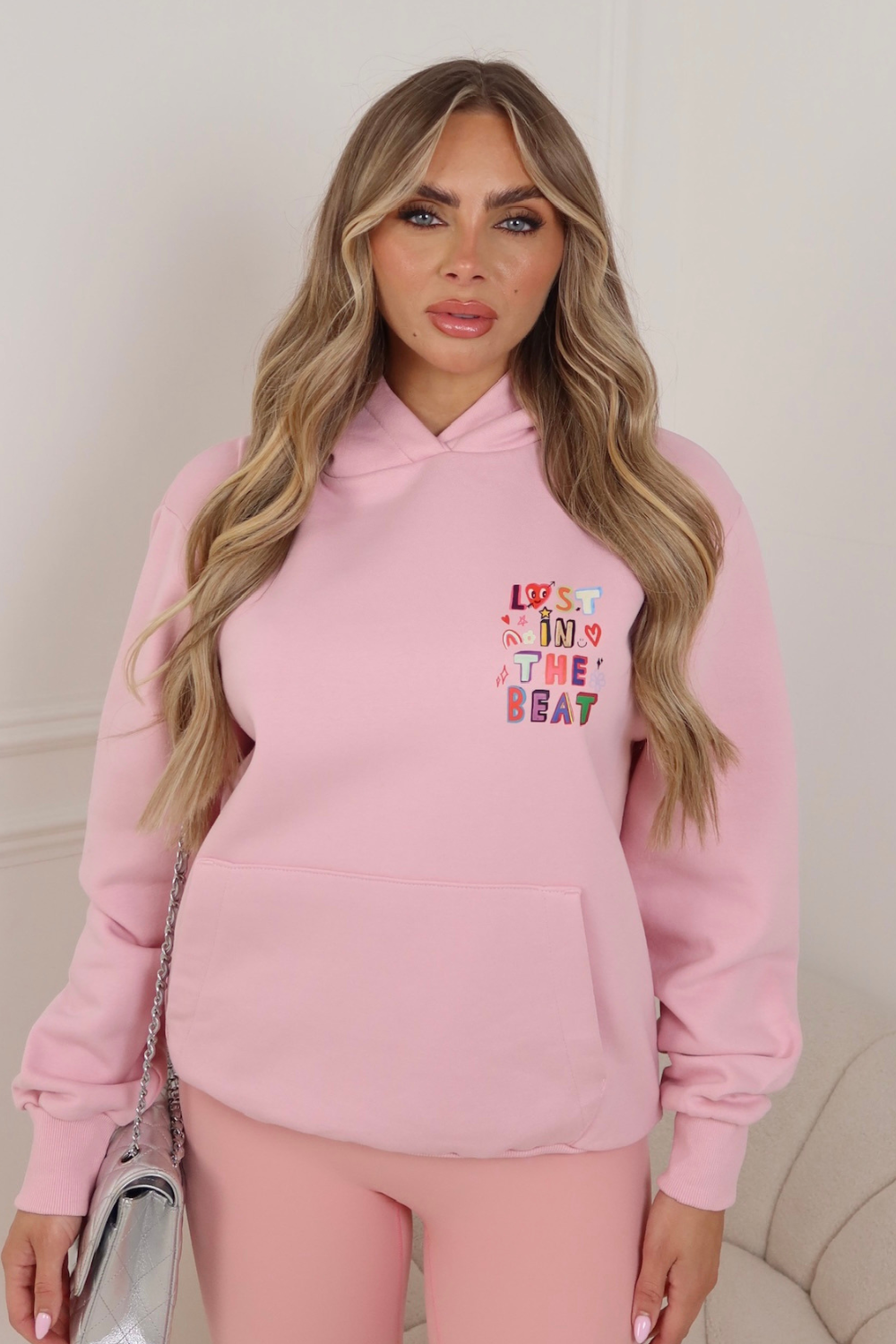 Lost in the beat pink printed premium hoodie