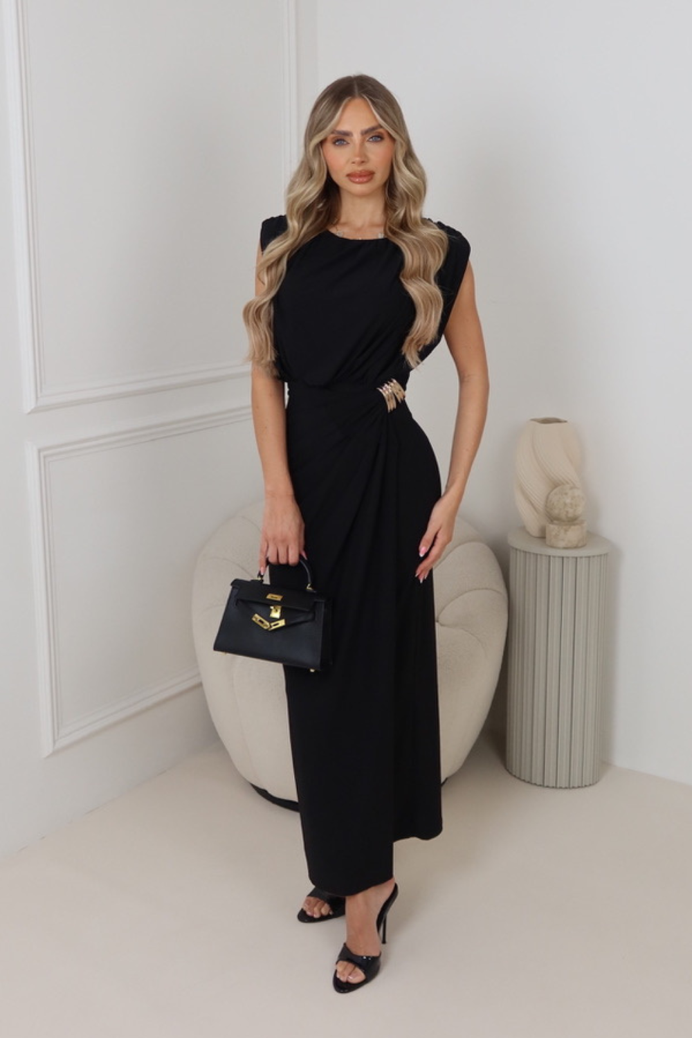 Leome black shoulder pad dress