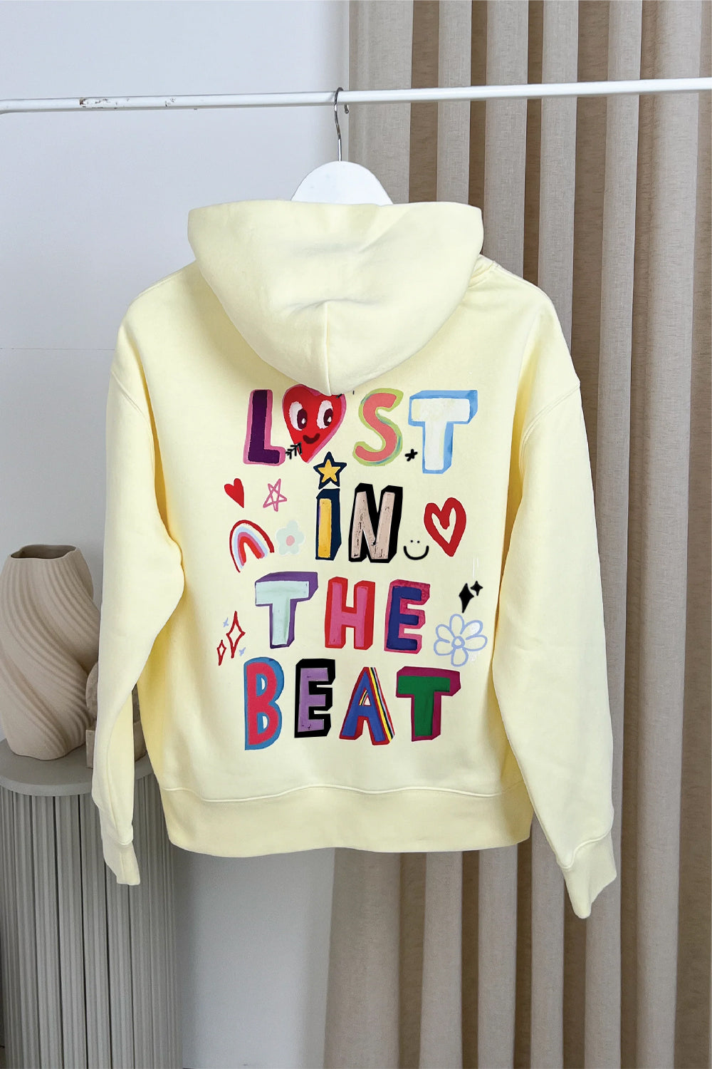 Lost in the beat butter printed premium hoodie